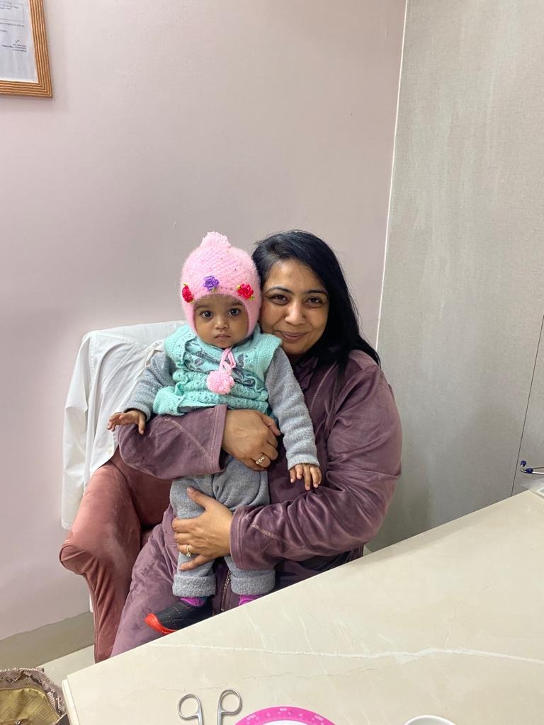Precious Smile: Baby Girl in Pink Beanie